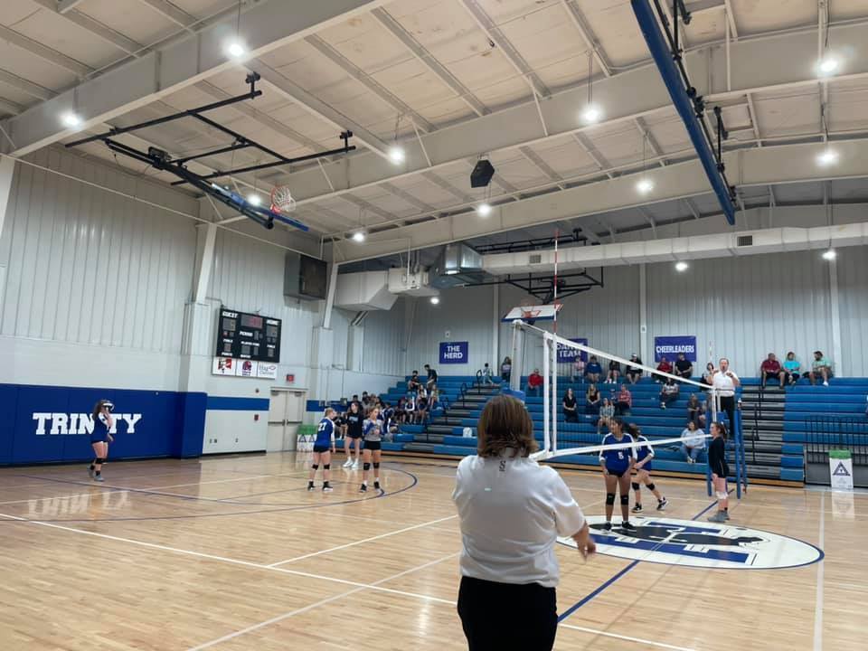 Image of girls volleyball game in progress.